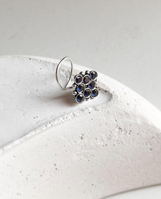 Tribal-style 925 Sterling Silver nose pin featuring blue CZ stone and wired back