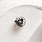 Tribal-style silver nose pin featuring blue CZ stone and wired back