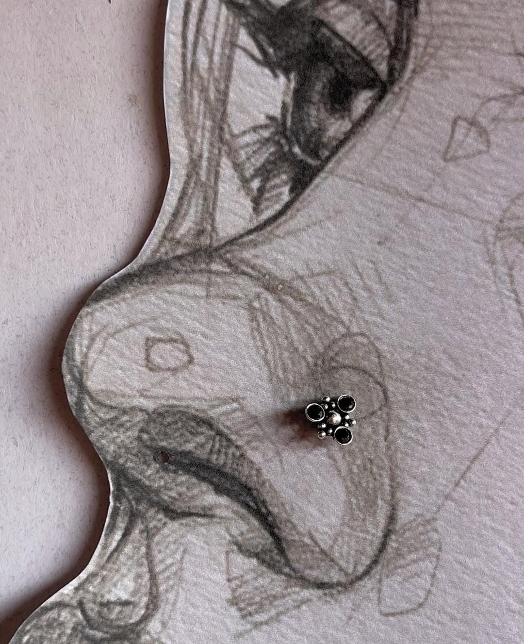925 silver nose pin with tribal rawa design and black CZ stone
