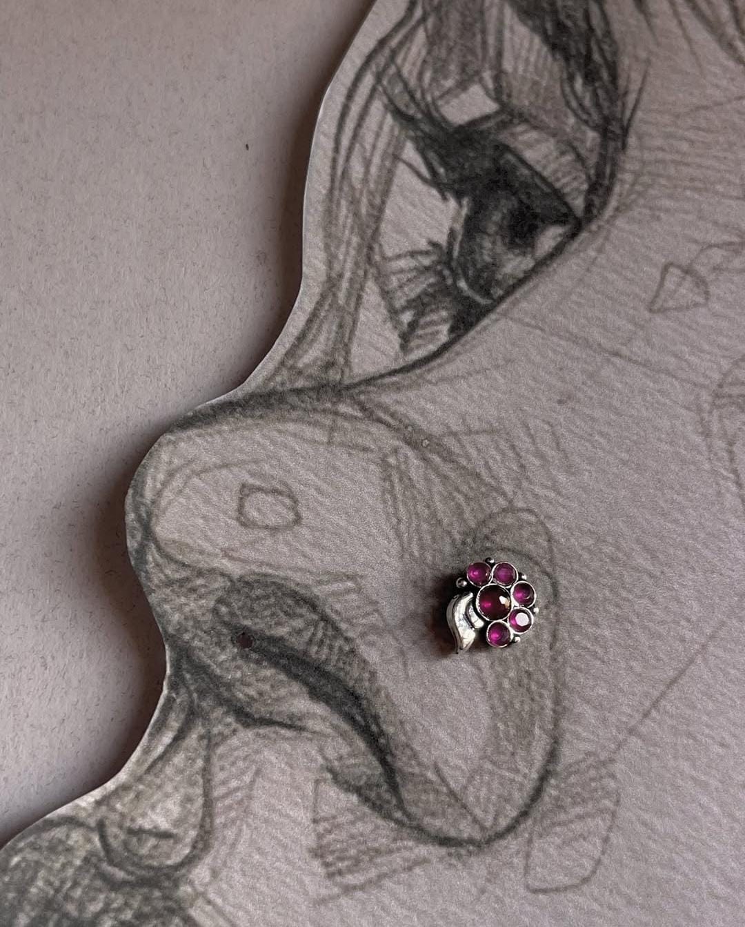 925 silver nose pin with tribal rawa design and pink CZ stone