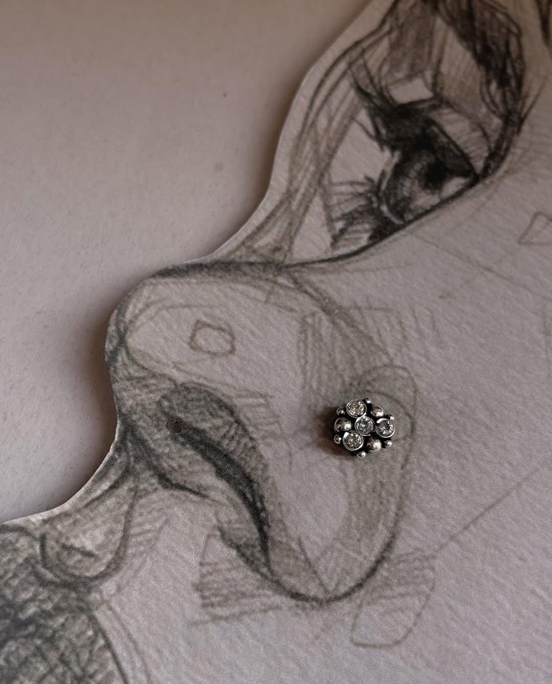 925 silver nose pin with tribal rawa design and white CZ stone