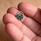 Tribal-style silver nose pin featuring green CZ stone and wired back