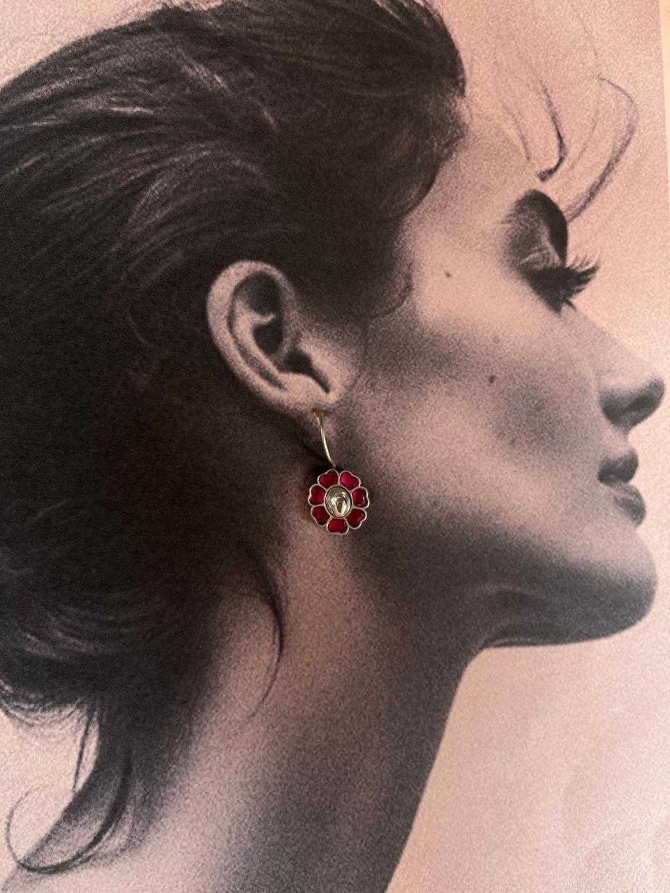 Vintage silver earrings with intricate pink Kundan and Meenakari detailing.