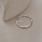 Elegant hammered sleek band ring in 925 silver