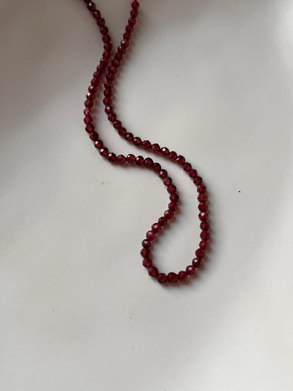 Close-up of Garnet 2MM Round Faceted Crystal Necklace