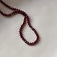 Close-up of Garnet 3-4mm Round Cut Crystal Necklace