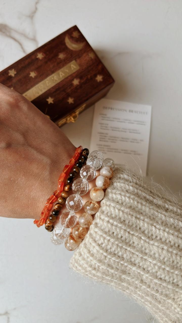 Handcrafted depression-relief bracelet featuring Clear Quartz, Citrine, Tiger Eye, and Carnelian natural crystals