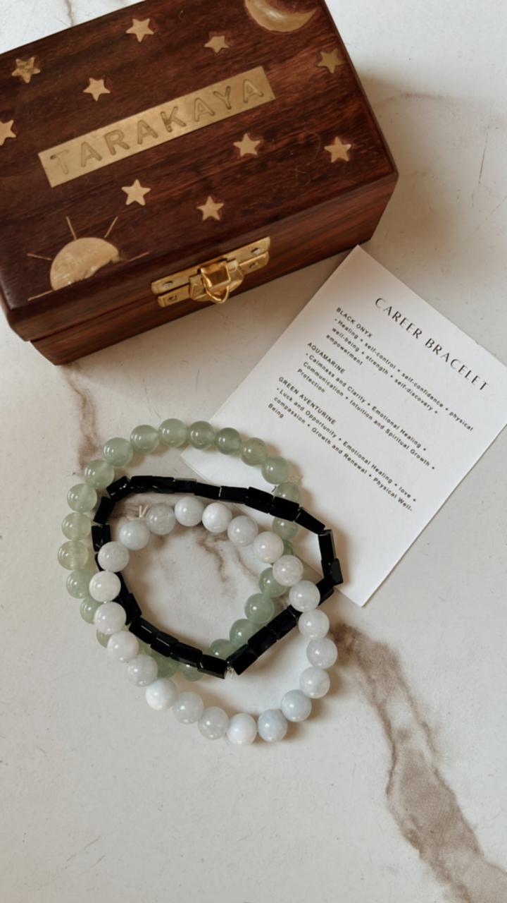 Handcrafted natural crystal bracelet featuring Aquamarine, Black Onyx, and Green Aventurine for career growth