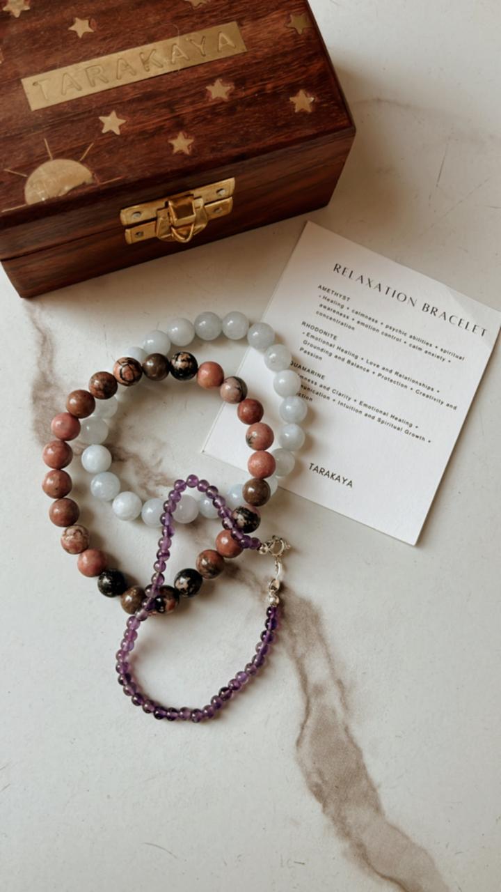 Natural crystal bracelet for relaxation with Rhodonite, Aquamarine, and Amethyst beads