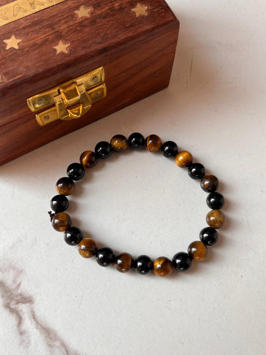 Natural crystal bracelet featuring Tiger Eye and Black Onyx 8mm stones