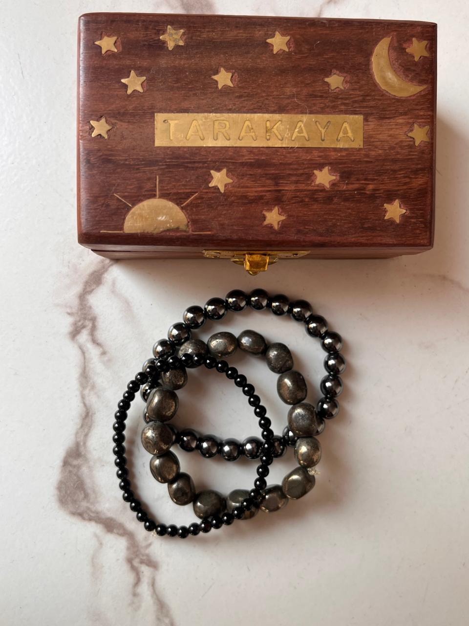 Natural crystal bracelet featuring Pyrite tumble, Black Tourmaline 4mm, and Hematite 8mm beads