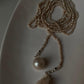 Close-up of Basra pearl knot necklace with lustrous pearls