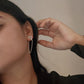 Handcrafted triangle silver studs with chain detail