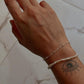 Handcrafted silver bracelet stack with Basra pearls and cable dots  
