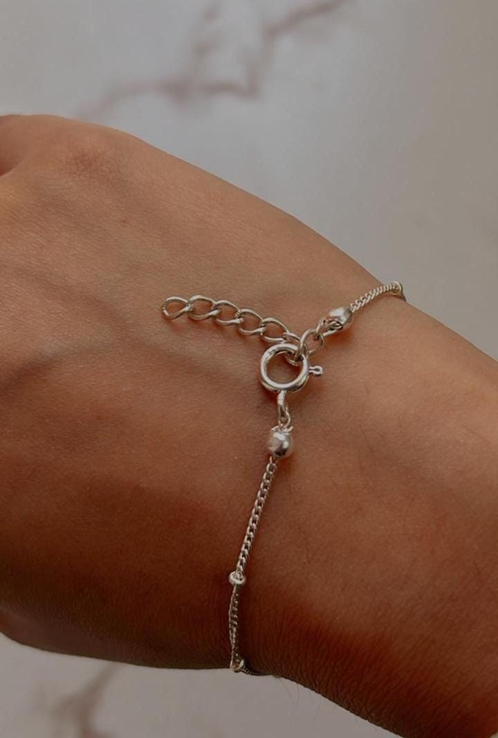 Boho-style Basra pearl and cable dot silver bracelet stack  