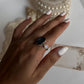 Handcrafted silver ring featuring blue coconut druzy and moonstone  