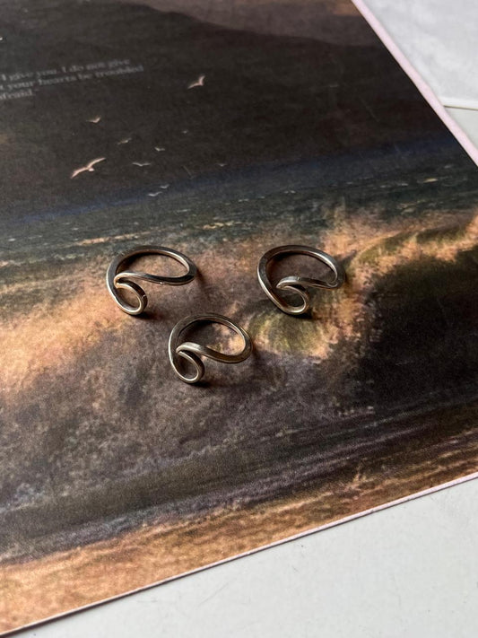 Sterling silver ring with beach wave design  