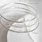 Hammered, rope, and plain silver bangle stack set  