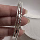 Handcrafted hammered, rope, and plain silver bangle set  