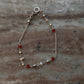 Traditional anklet with red onyx and pearl beads