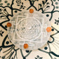 Energy-charged selenite plate featuring Shree Yantra