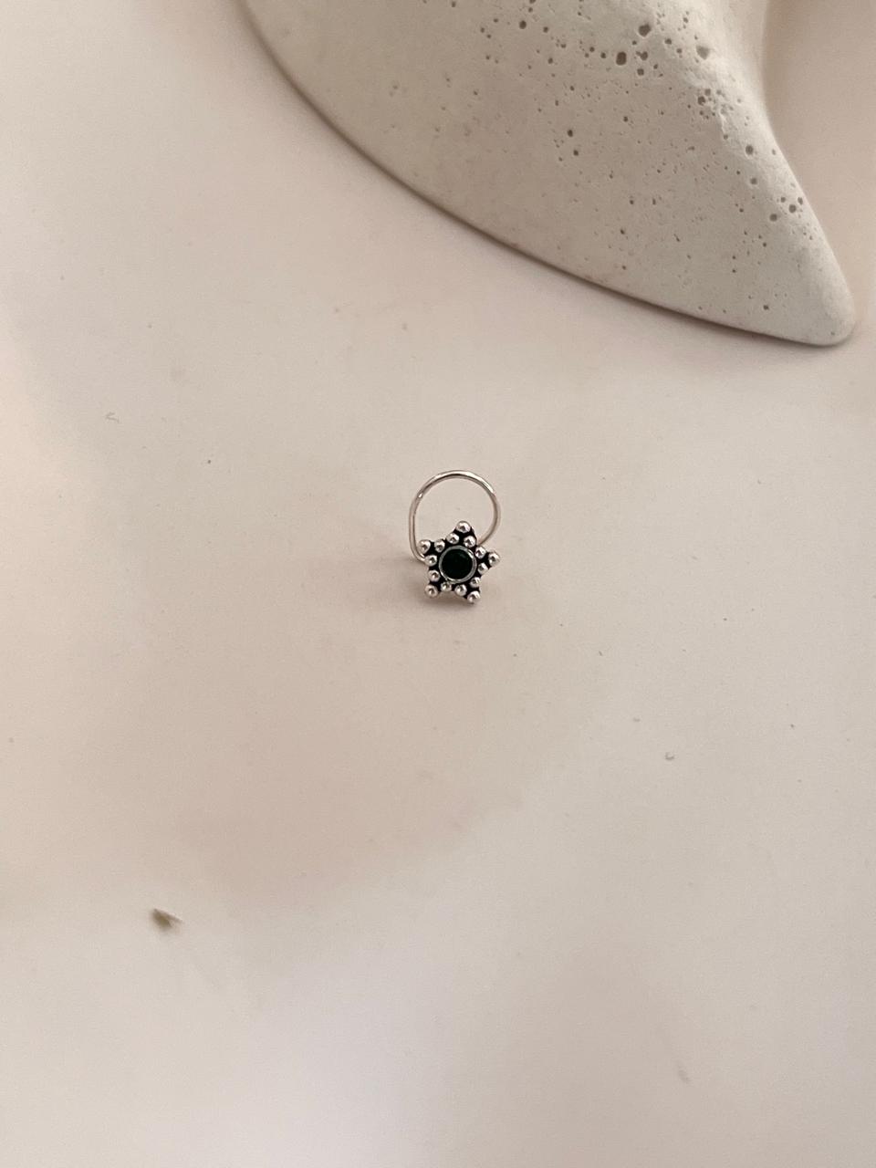 Elegant sterling silver rawa nose pin with green CZ stone  