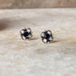 Elegant flower design sterling silver earrings with blue CZ stones  