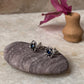 Stylish sterling silver flower earrings with blue CZ stones