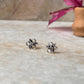 Minimalist white CZ flower stud earrings in 925 silver