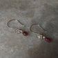 Delicate silver earrings with cherry blossom design and gemstones  