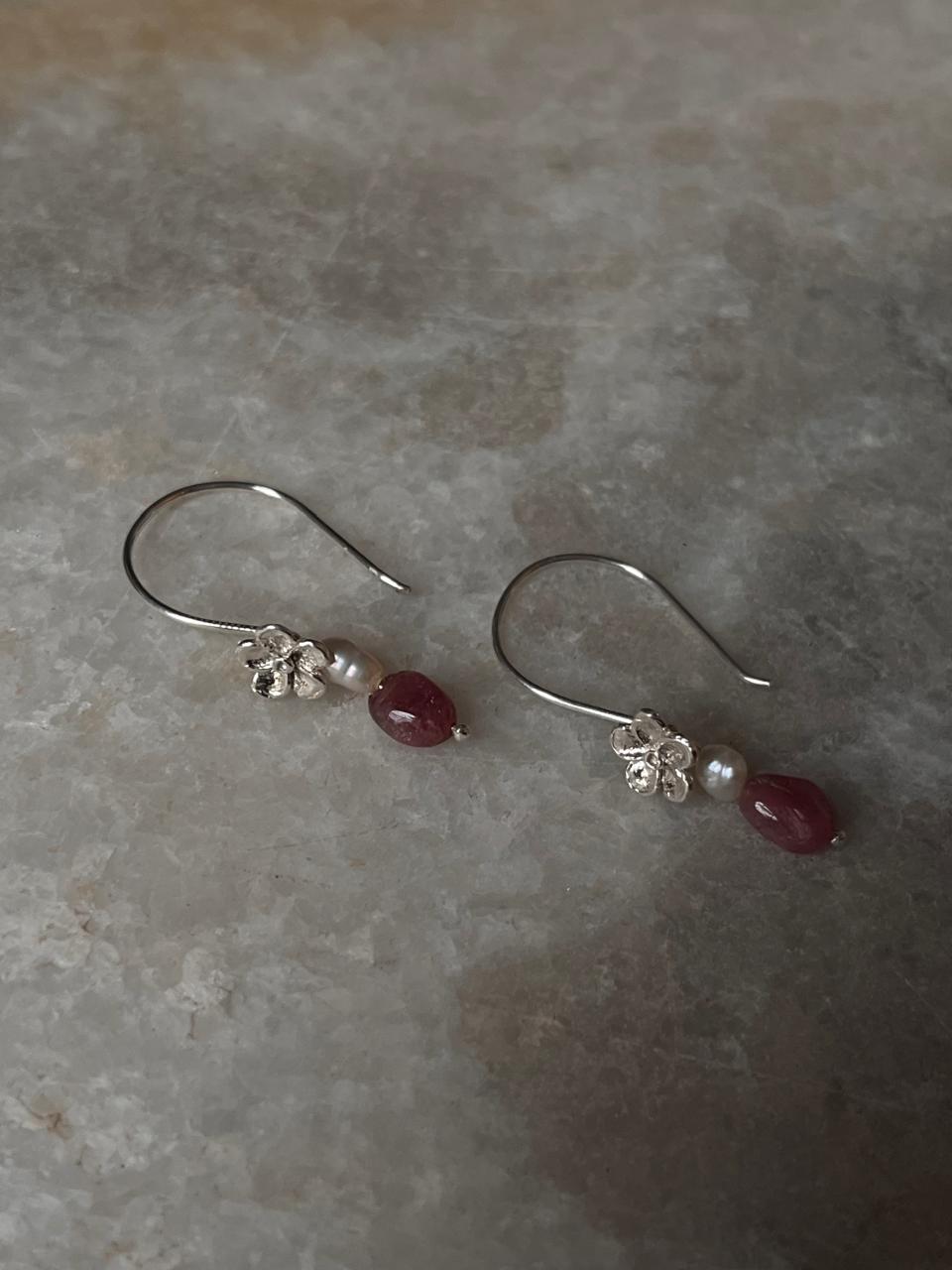 Delicate silver earrings with cherry blossom design and gemstones  