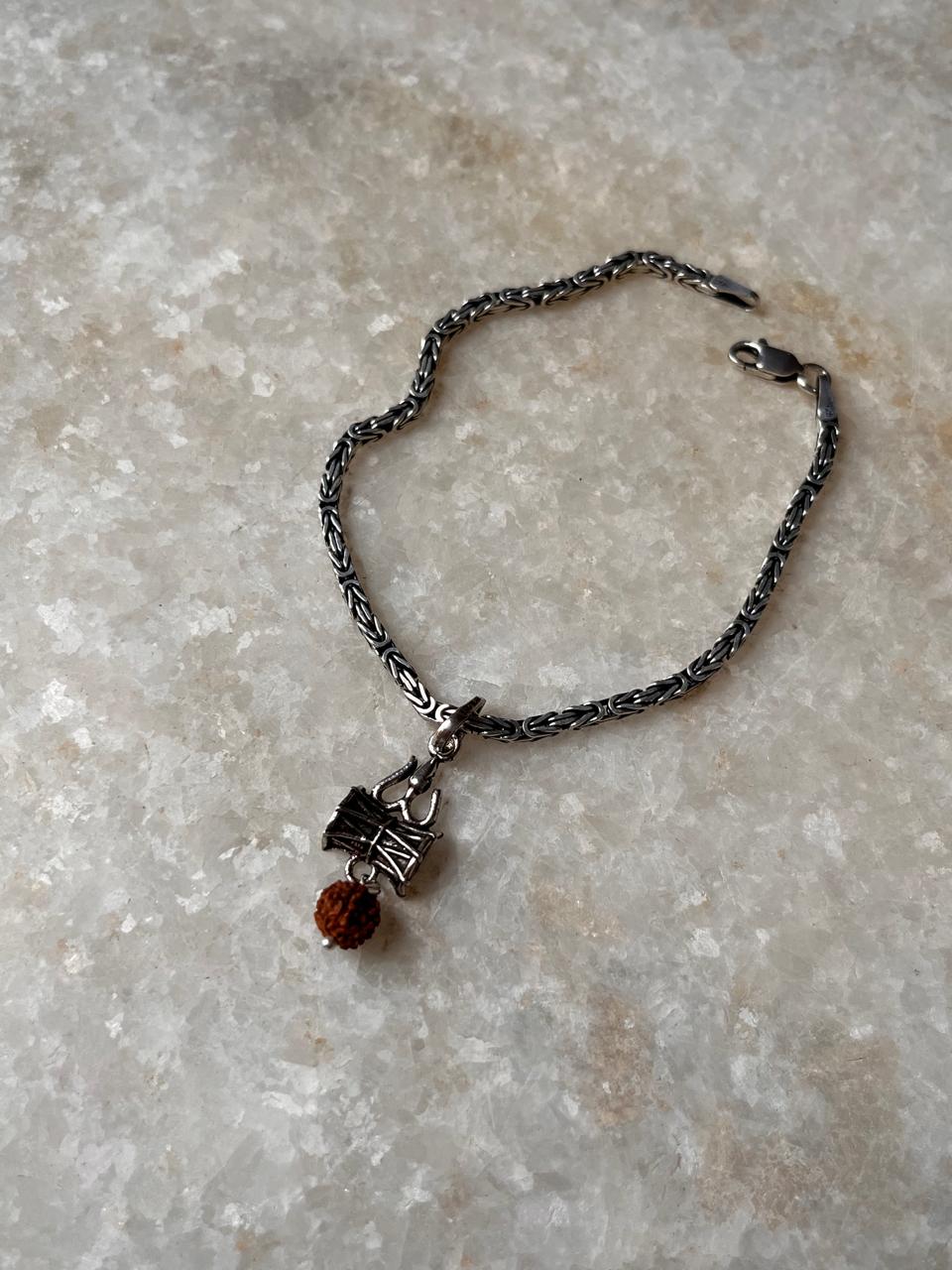 Antique style silver rakhi with Rudraksh beads