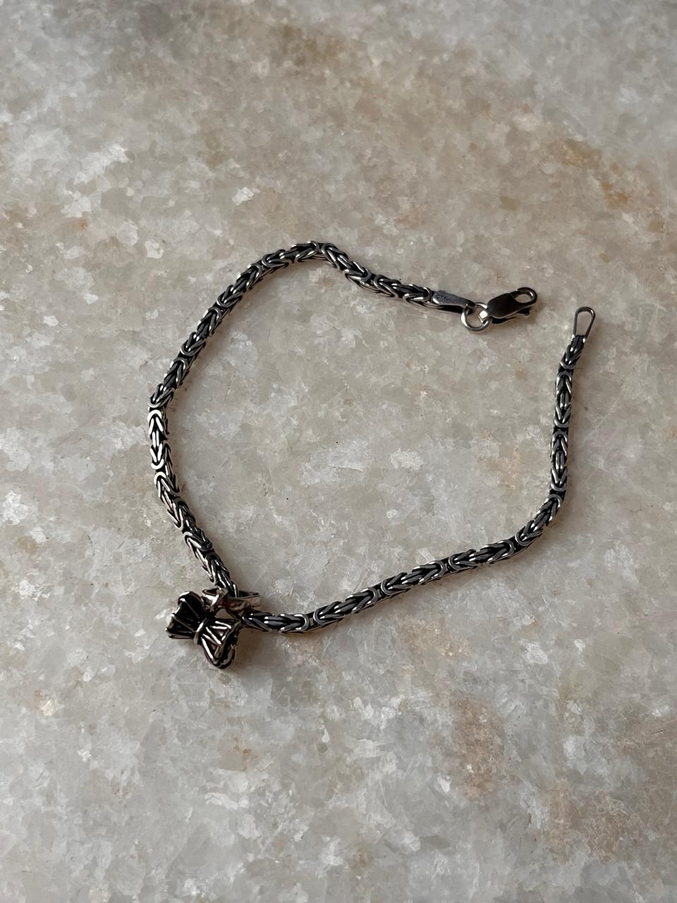 Handcrafted Shiva Damru rakhi in silver