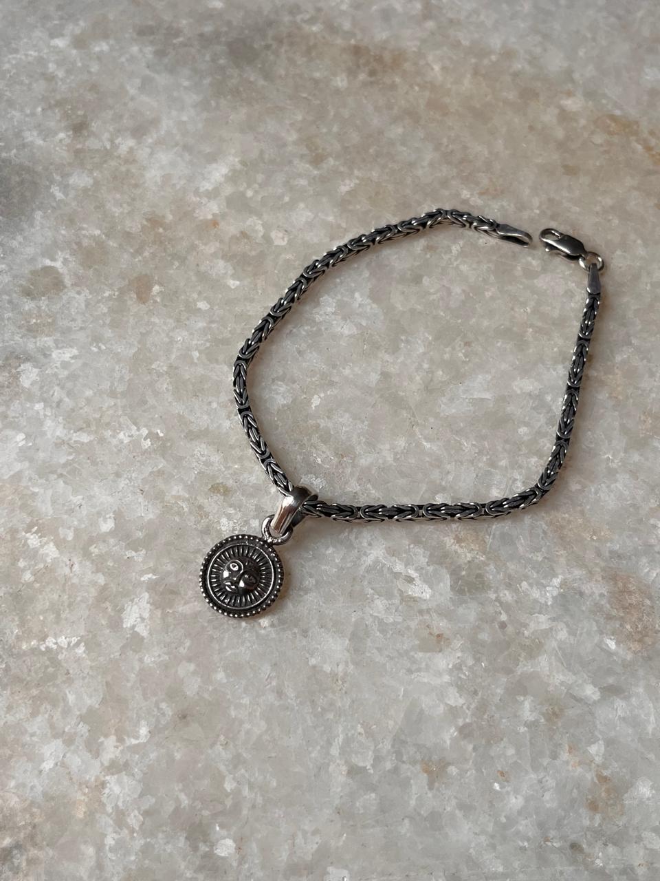 925 sterling silver rakhi with Surya motif  