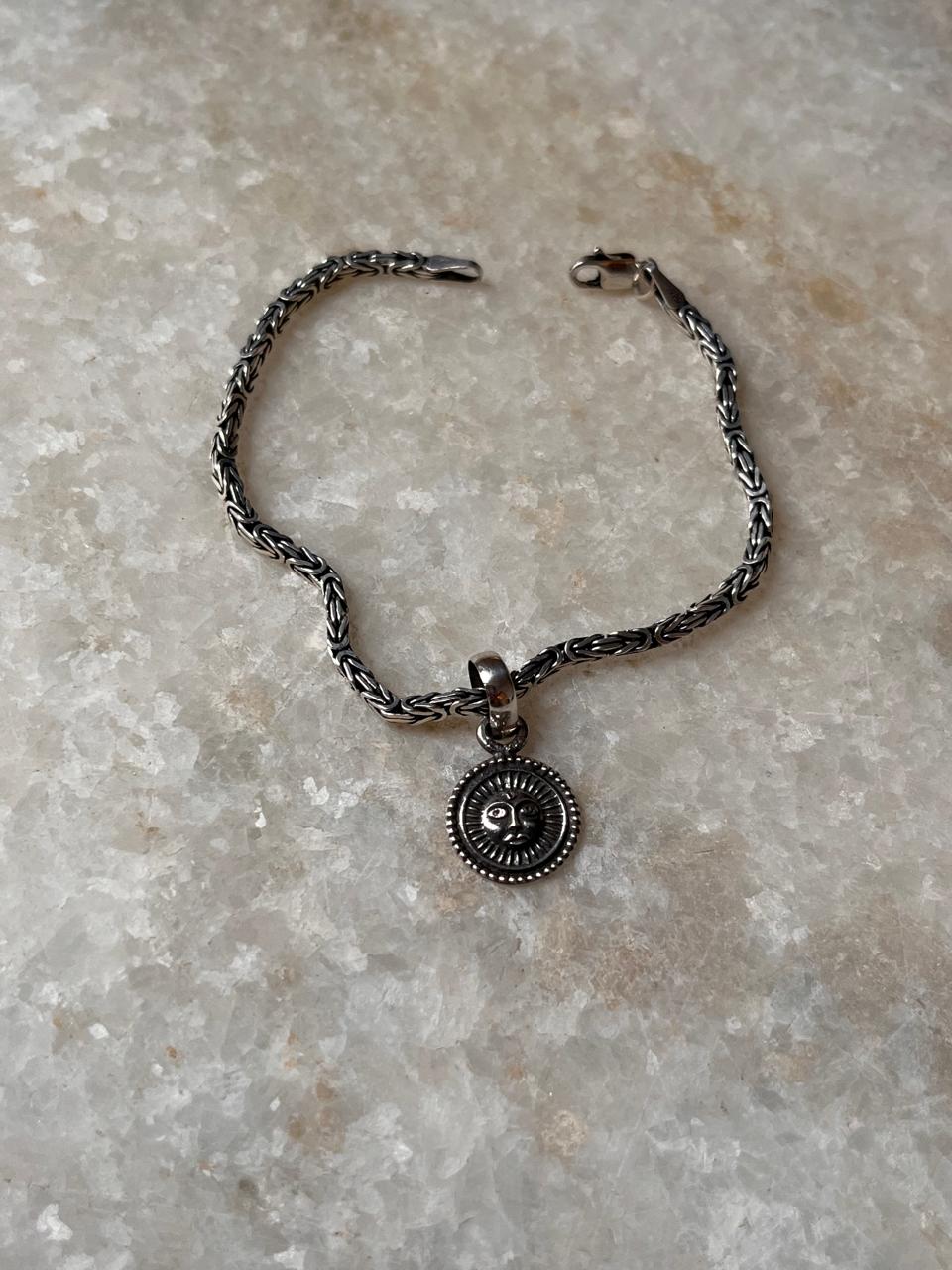 Antique Surya silver rakhi in 925 sterling silver  