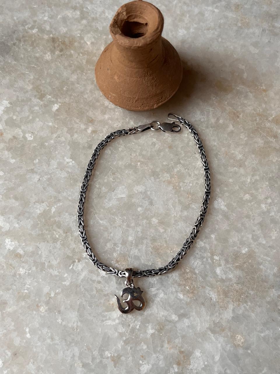  Plain Aum rakhi in antique finish sterling silver