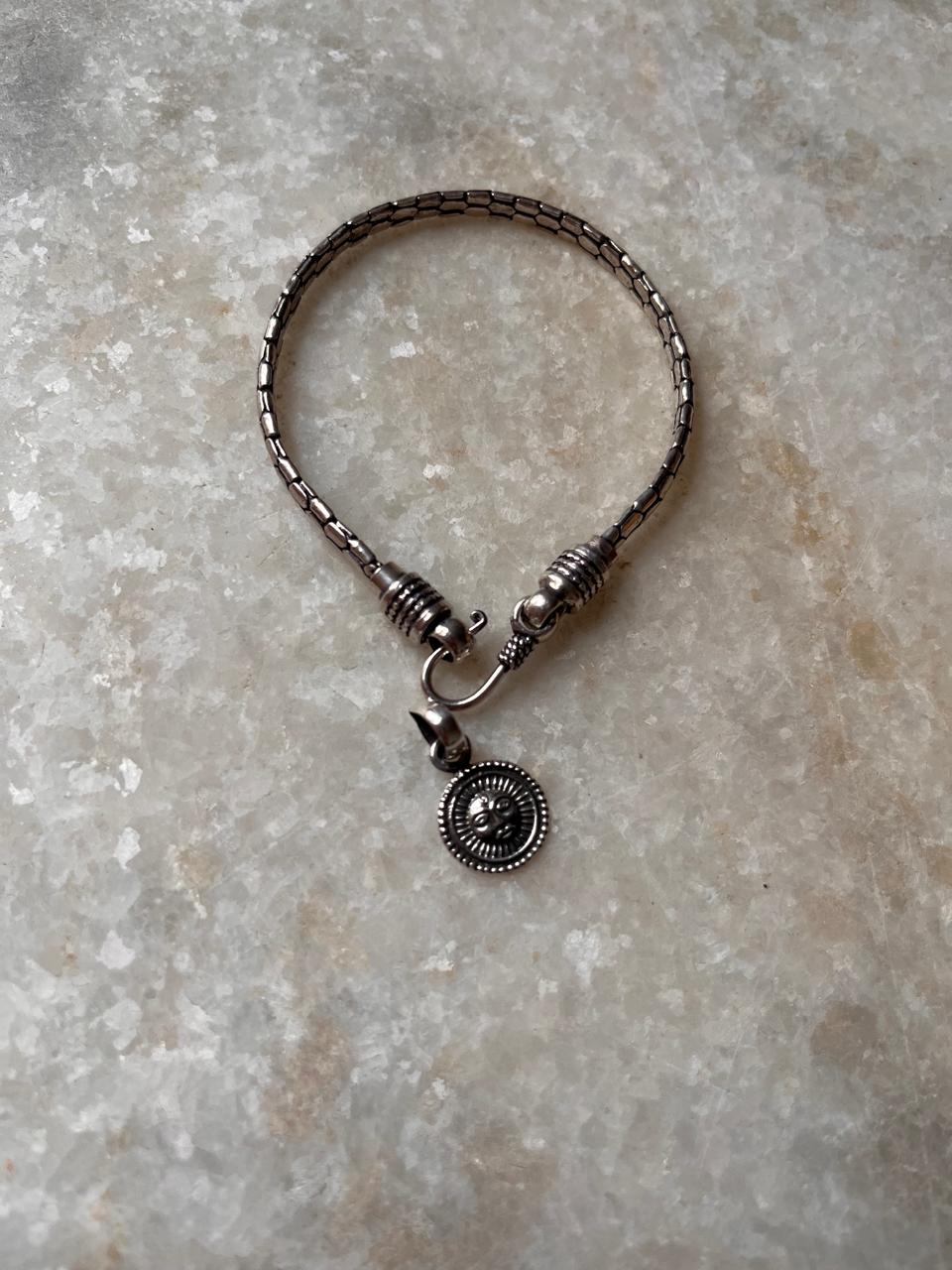 925 sterling silver rakhi featuring Surya and snake motif  