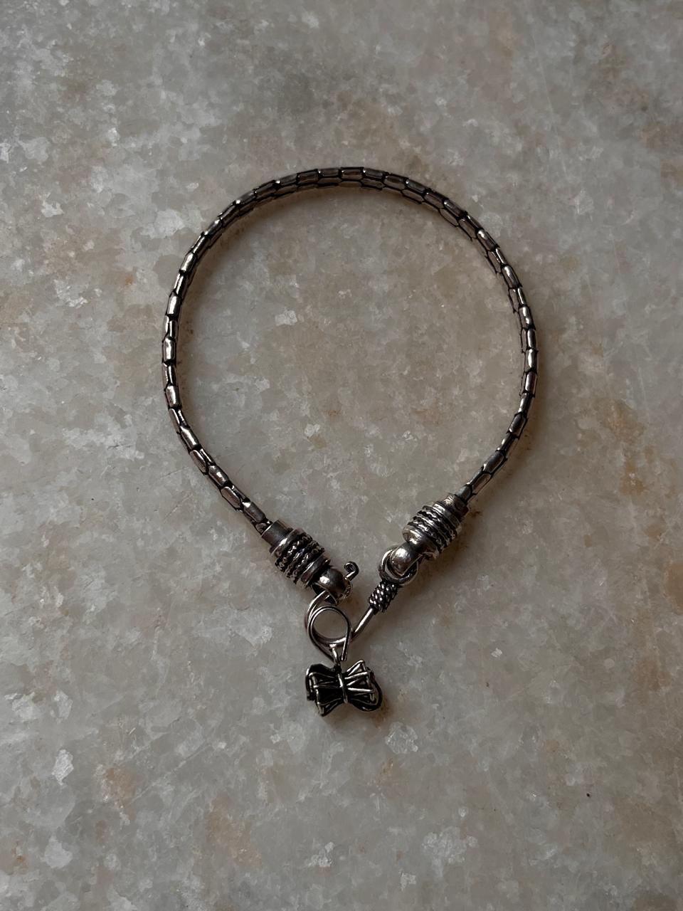  Small Damru rakhi in 925 sterling silver with snake design  