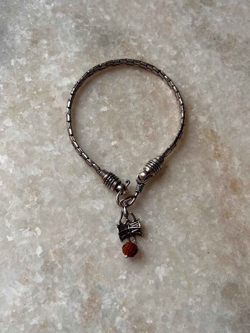 Sterling silver rakhi with snake pattern and Shiva symbols