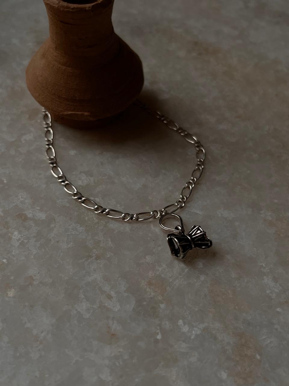 925 sterling silver rakhi with Figaro chain and Damru charm  