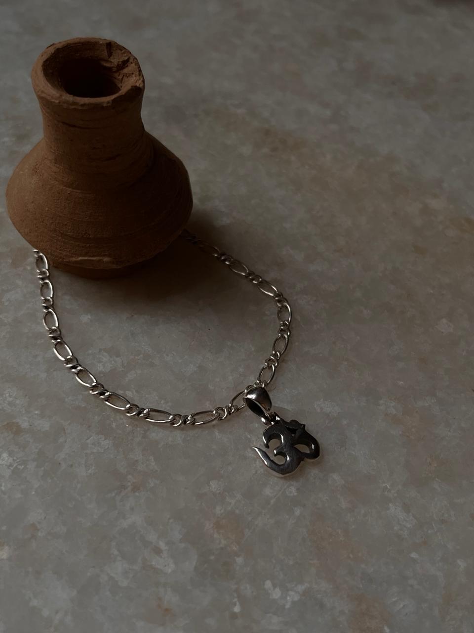 Figaro chain rakhi with plain Om charm in 925 silver  