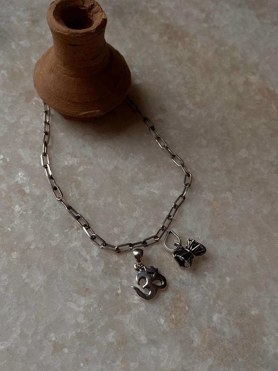 925 silver Om rakhi with minimalist paper clip design