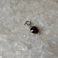 Sterling silver charm with love heart garnet