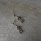Ethnic silver jhumka earrings with lavender tones