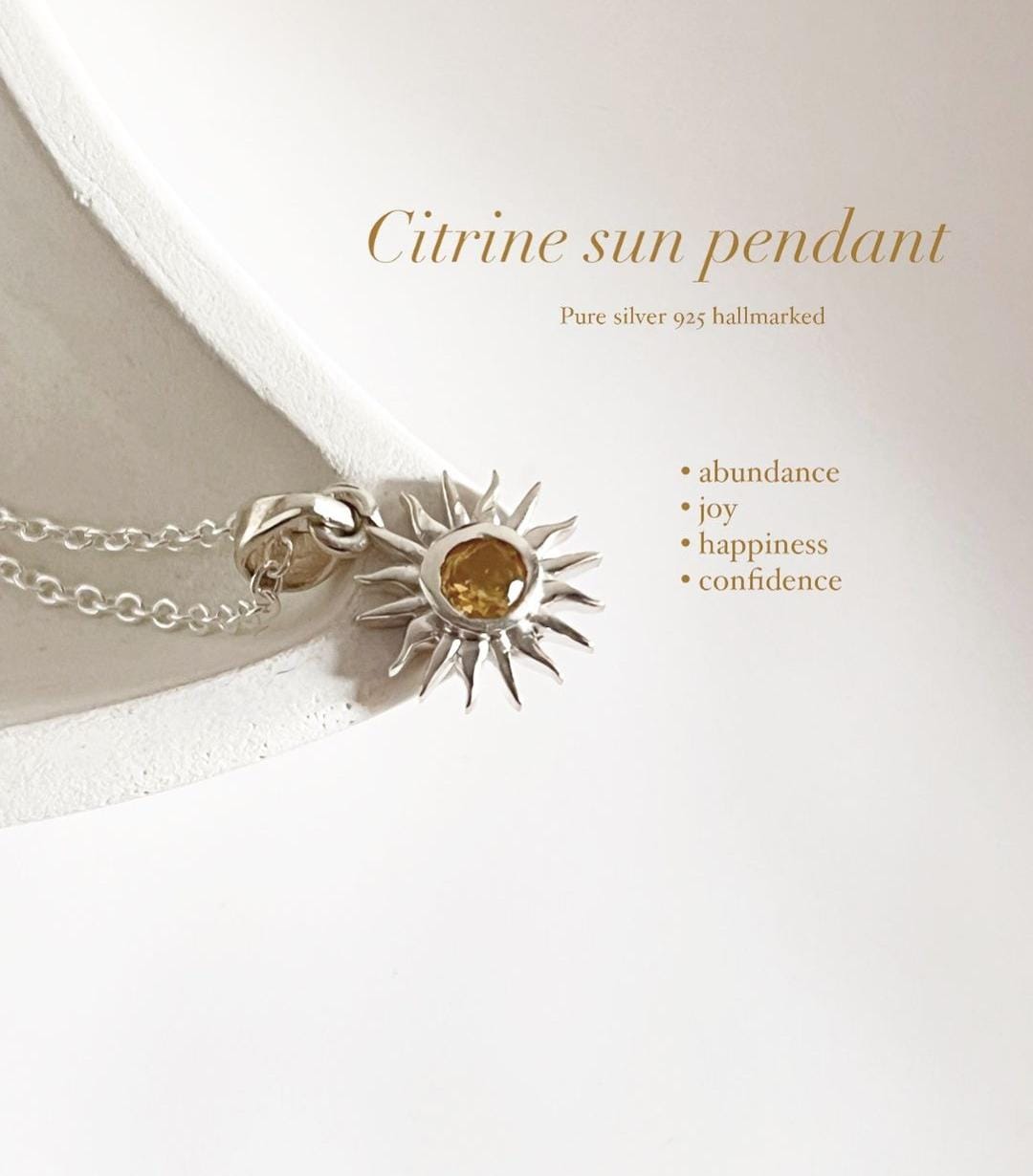 Elegant citrine gemstone pendant designed like the sun, with chain