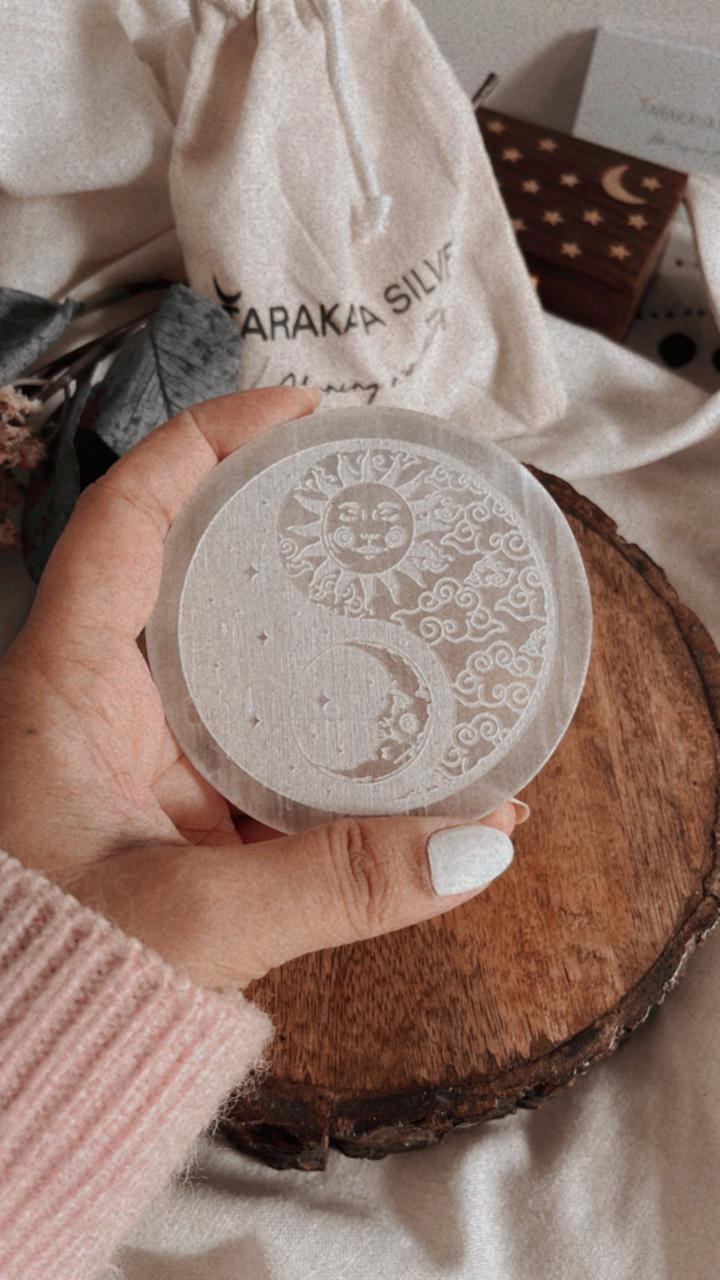 Sacred selenite plate for crystal recharging with Yin Yang, Moon, and Sun symbols