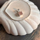 Charming square cut rose quartz pendant with sterling silver accents