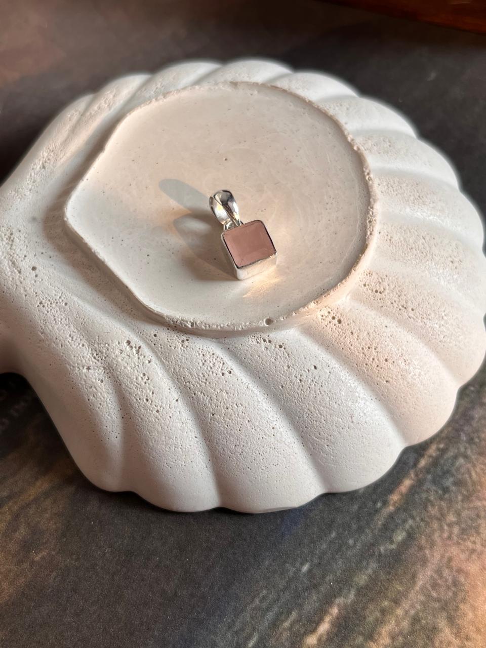 Charming square cut rose quartz pendant with sterling silver accents