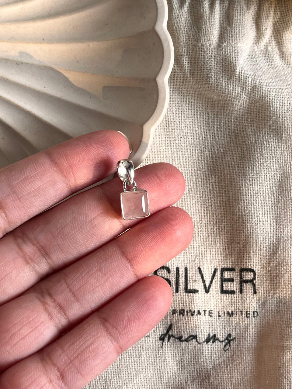 Rose quartz square cut pendant in sterling silver