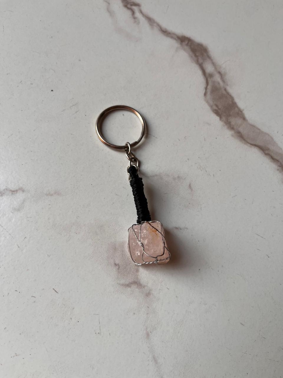 Handcrafted rose quartz key ring with polished finish
